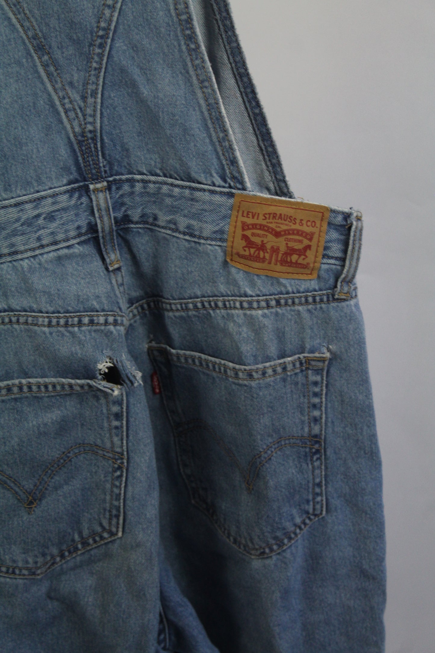 Women's Levi Denim Overalls Partially Distressed Size Medium