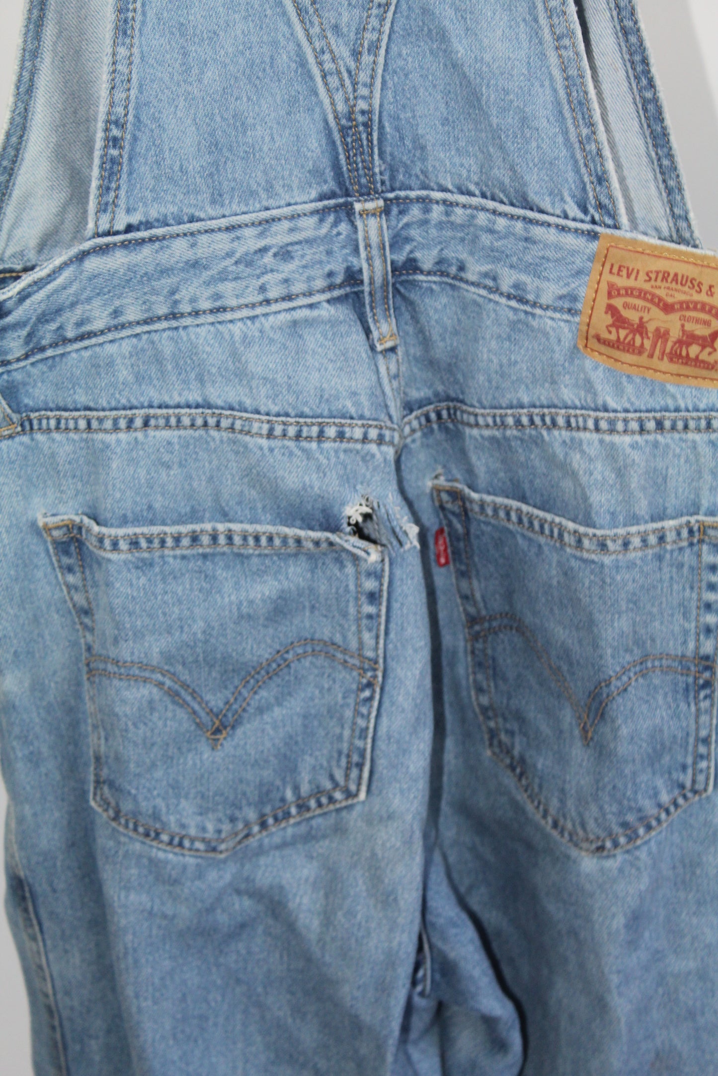 Women's Levi Denim Overalls Partially Distressed Size Medium